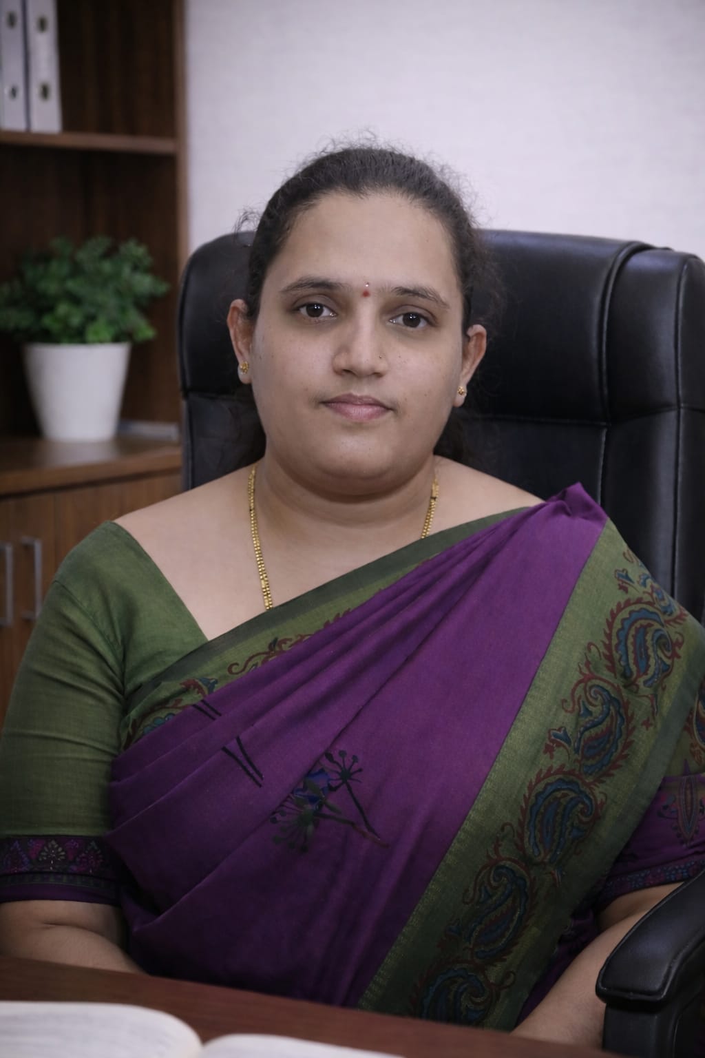 Prof. DIVYA C B